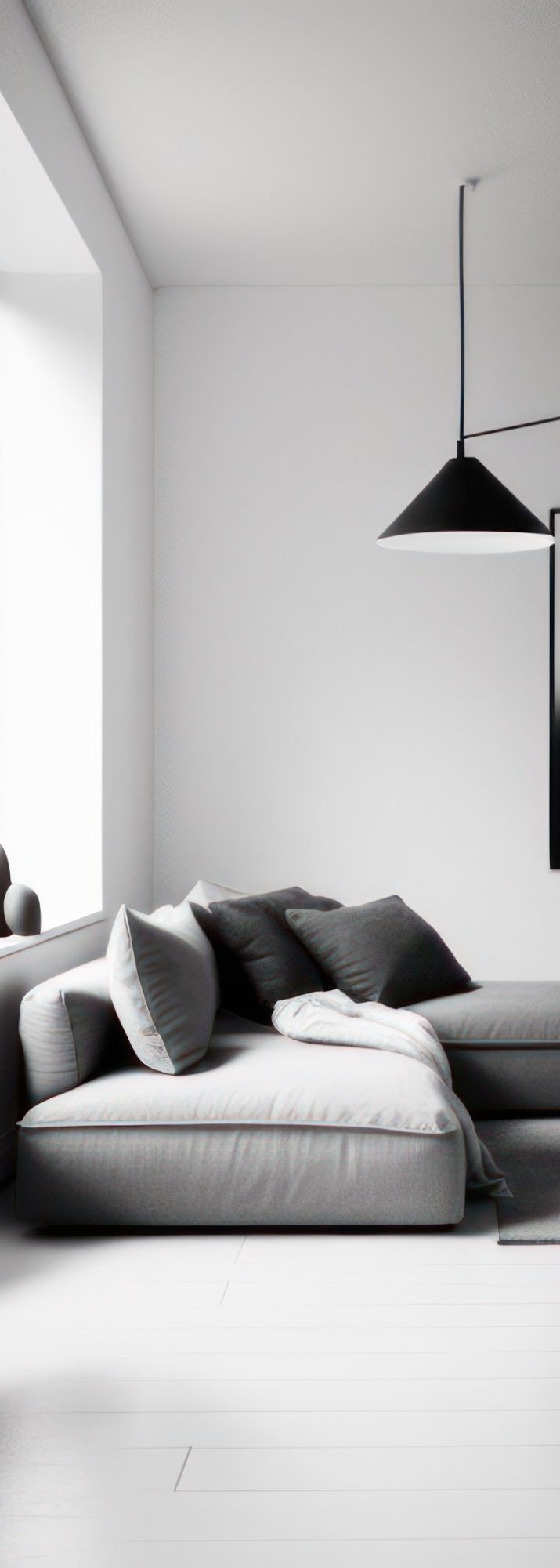 minimalistische Sitzecke Moderne, minimalistische Sitzecke mit grauem Sofa und stilvoller Beleuchtung.