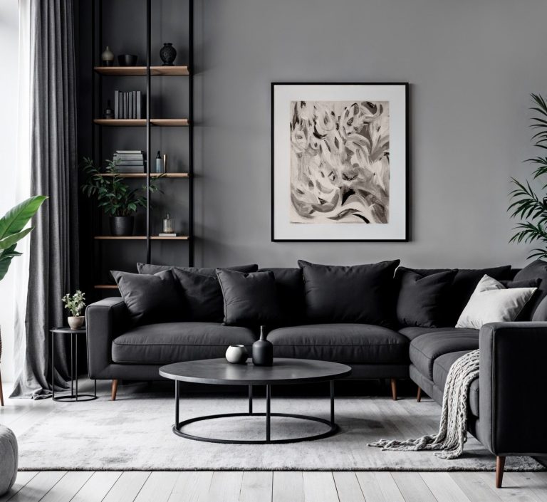 Modernes, graues Wohnzimmer Modernes, graues Wohnzimmer mit schwarzem Sofa, rundem Tisch und Pflanzen.